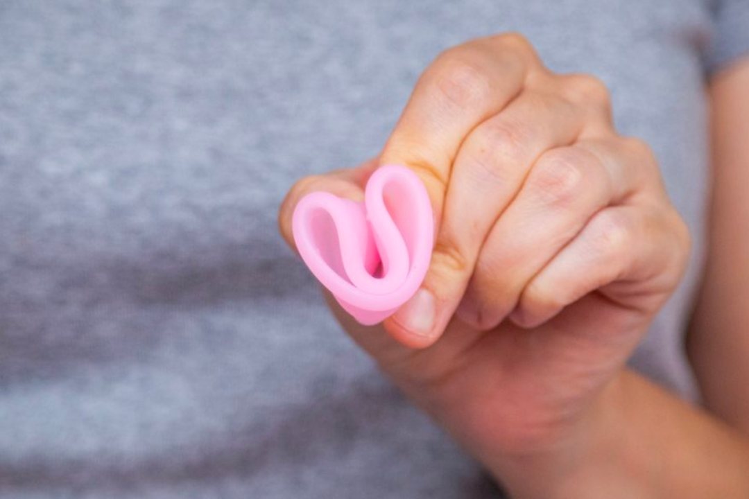 Folded menstrual cup