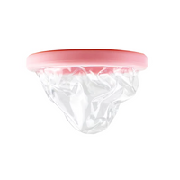 Pink disposable menstrual disc, side view through clear plastic wrapper
