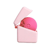 Pink microwave steriliser case with lid open, showing circular steriliser part