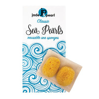 Reusable sea pearl menstrual sponges, two round yellow sponge pads in paper pack