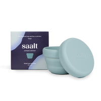 Sage green compact menstrual cup sanitiser with hinged lid and base container