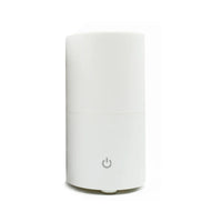 Menstrual cup steam steriliser with power button on white unit
