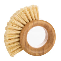Bamboo vegetable brush with circular loop handle and pale tan cleaning bristles