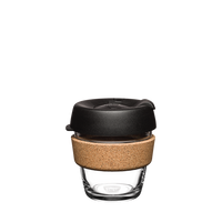 Reusable coffee cup with tempered glass body, cork band, and black lid
