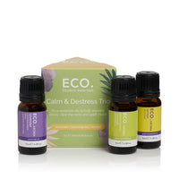 Essential oil trio 3 pack with three dark bottles and green Calm & Destress box