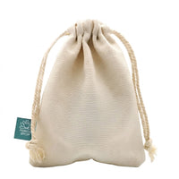 Beige cotton drawstring storage pouch with gathered top and braided tassels