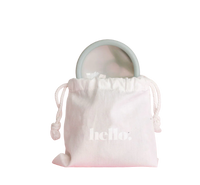 Light pink cotton storage bag with drawstring and 'hello.' print