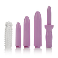Vibrating dilator set with four purple silicone tips and textured sleeve