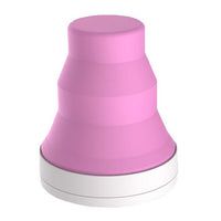 Compact UV steriliser device with purple top and white base, rounded capsule shape