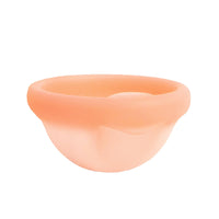 Reusable menstrual disc, orange cup shape with smooth outer rim